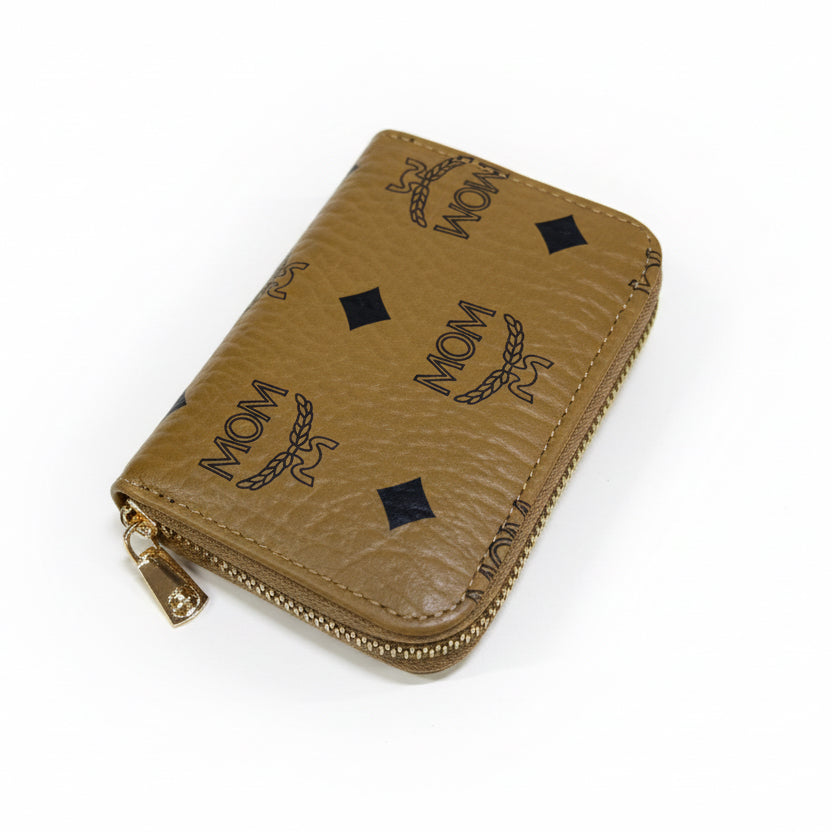 Beige wallet with black branding on a white background