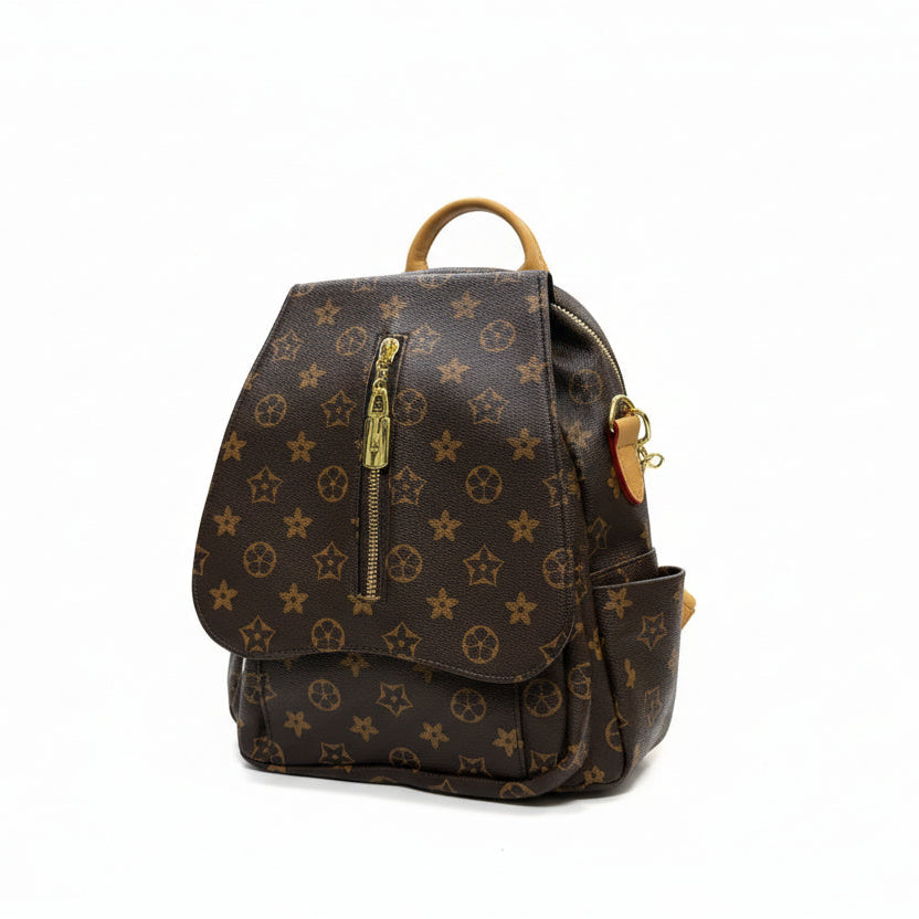 Designer handbag with pattern on a white surface