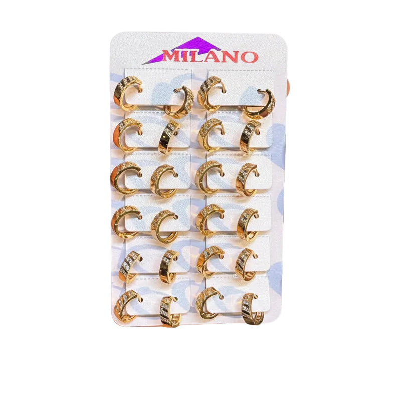 Pack of gold earrings on a Milano branded card