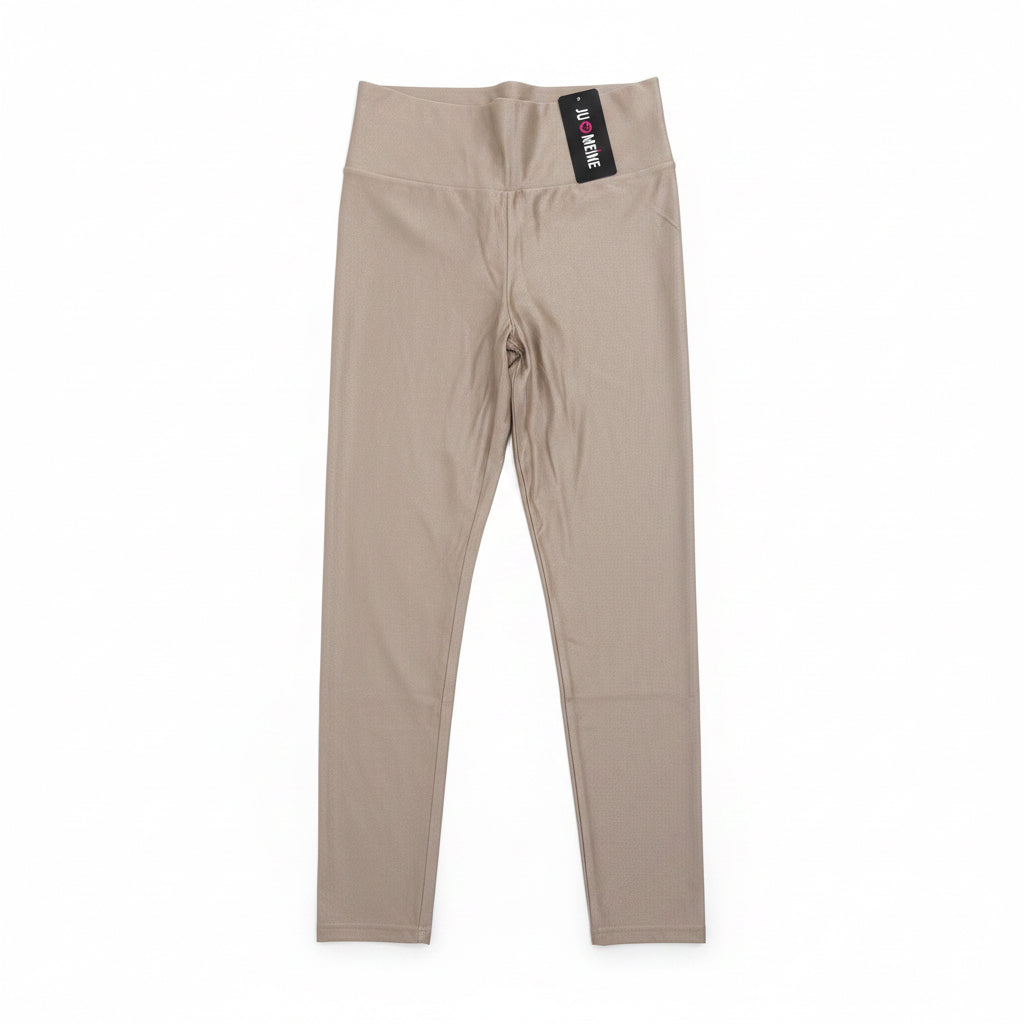 Beige leggings with a brand tag on a white background