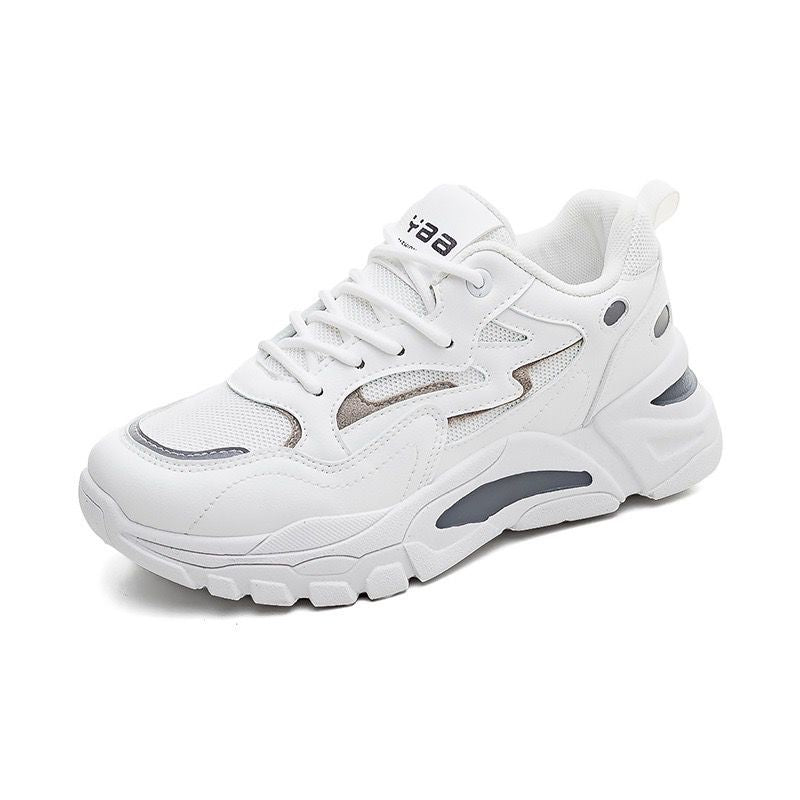 White sneaker with gray accents on a white background