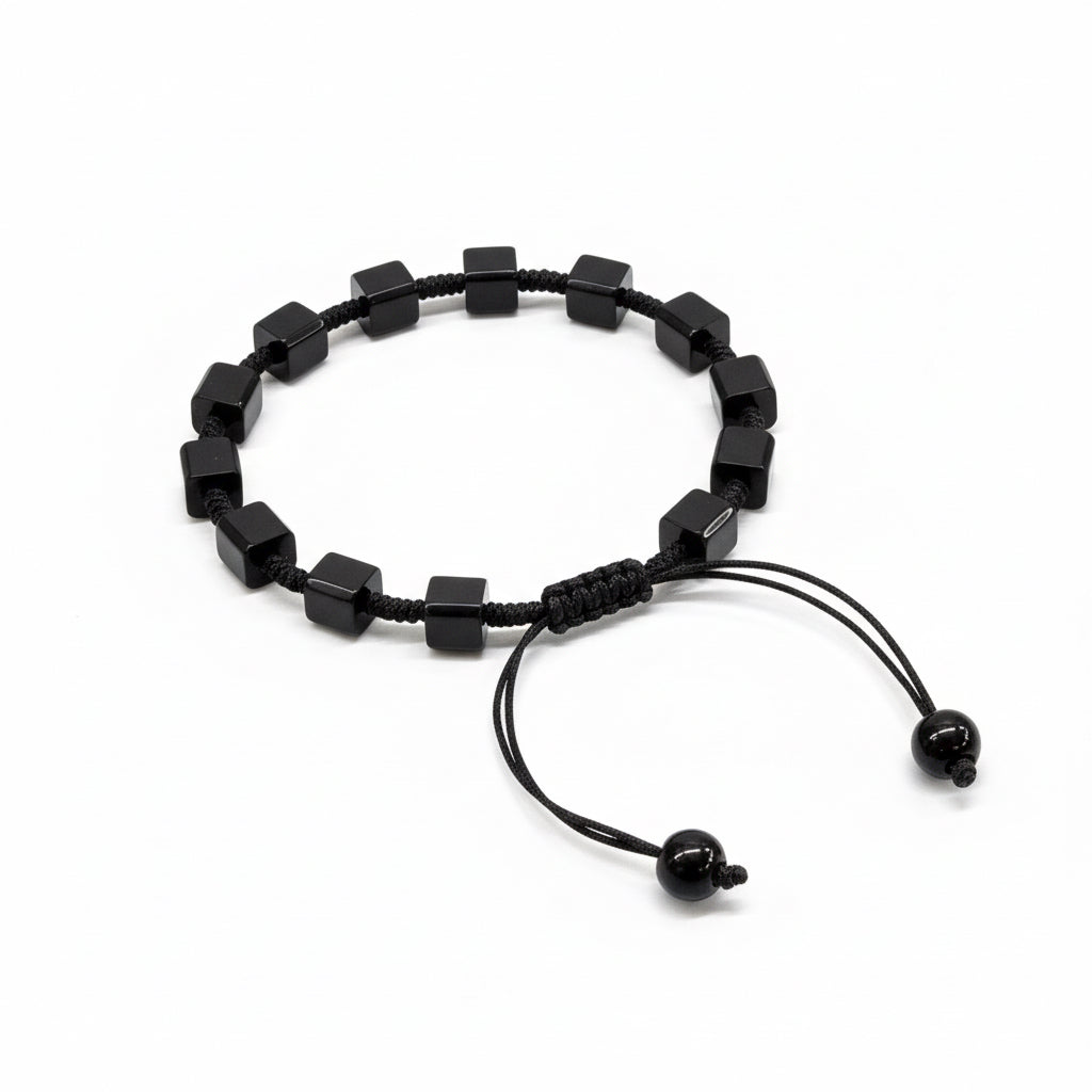 Black beaded bracelet on a white background