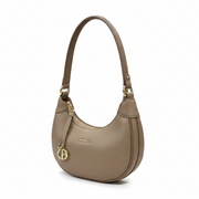 Beige handbag with gold accents on a white background