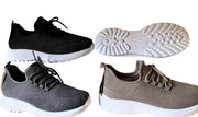 Three pairs of casual shoes in black, gray, and brown on a white background