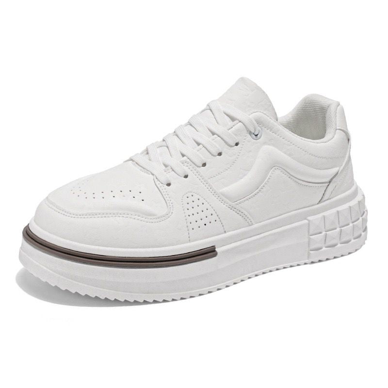 White sneaker with a thick sole on a white background