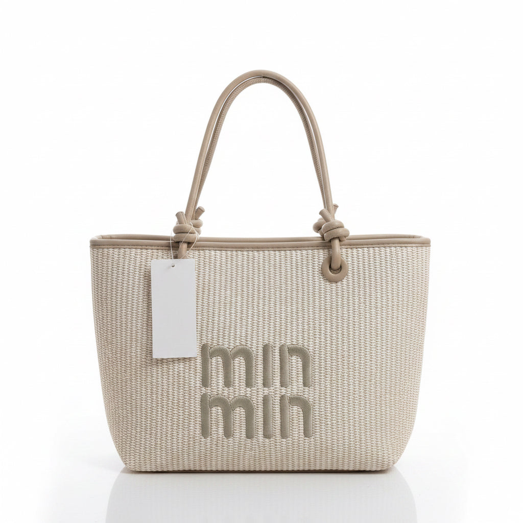 Woven handbag with 'miu miu' logo on a light background