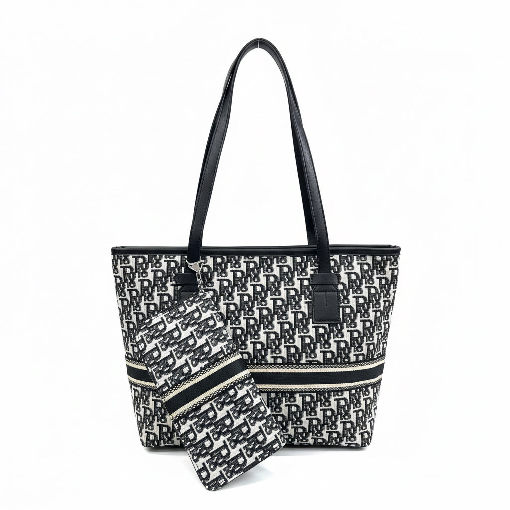 Black and white patterned tote bag with matching pouch on a white background