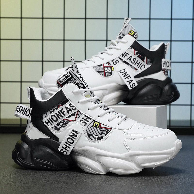 White and black sneakers with brand tags on a grid background