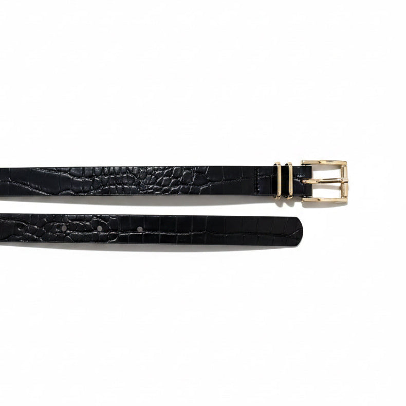 Black crocodile-patterned belt with a gold buckle on a white background