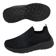Black slip-on sneaker with sole showing texture on a white background