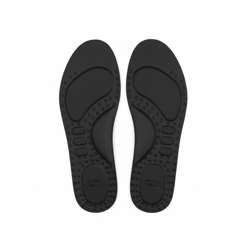 Pair of black shoe insoles on a white background