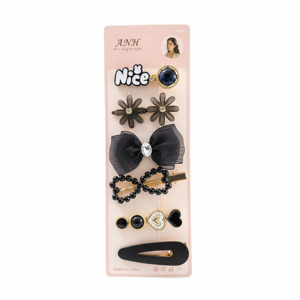 Set of hair accessories on a pink packaging with 'ANH' branding.