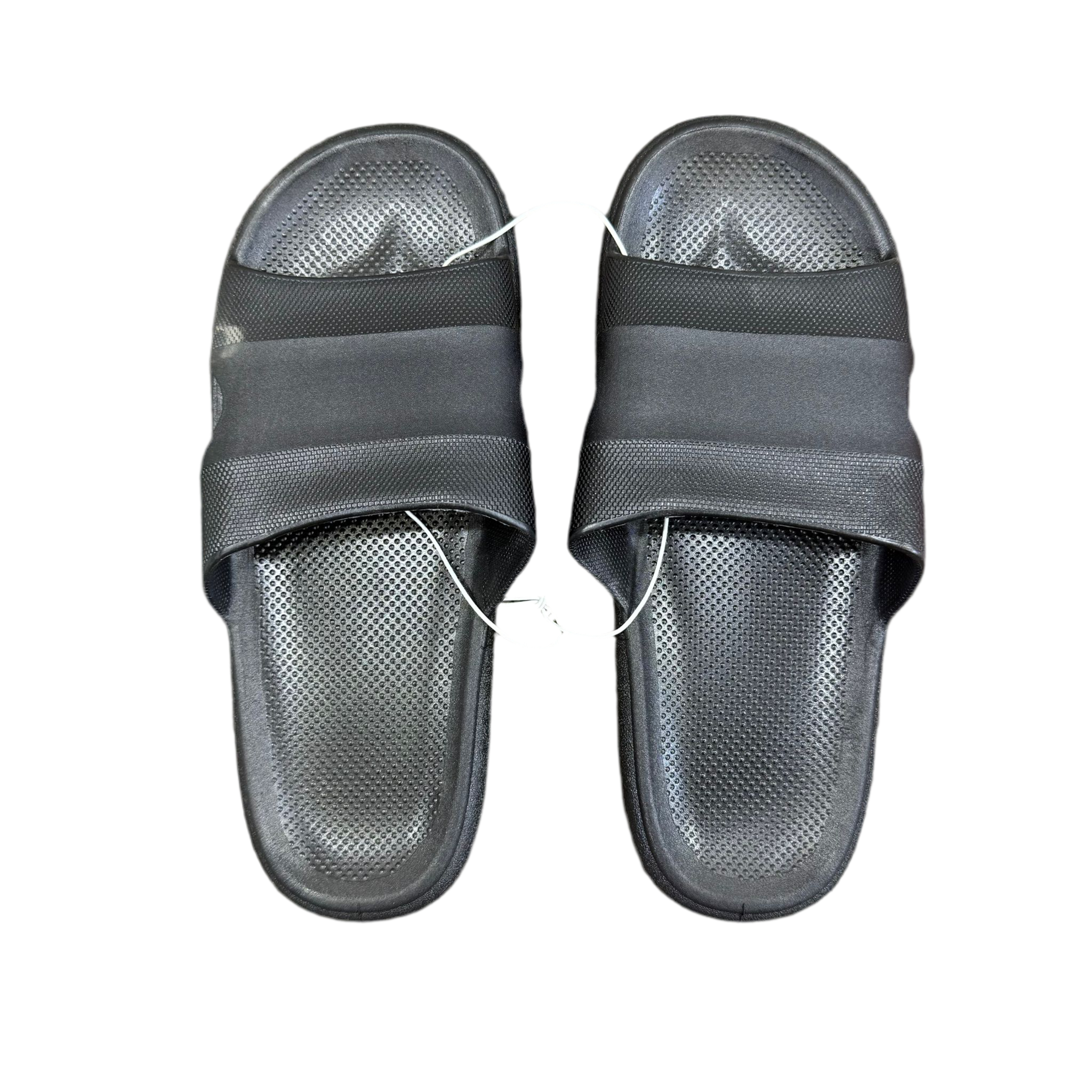 Pair of gray slides with mesh design on a white background
