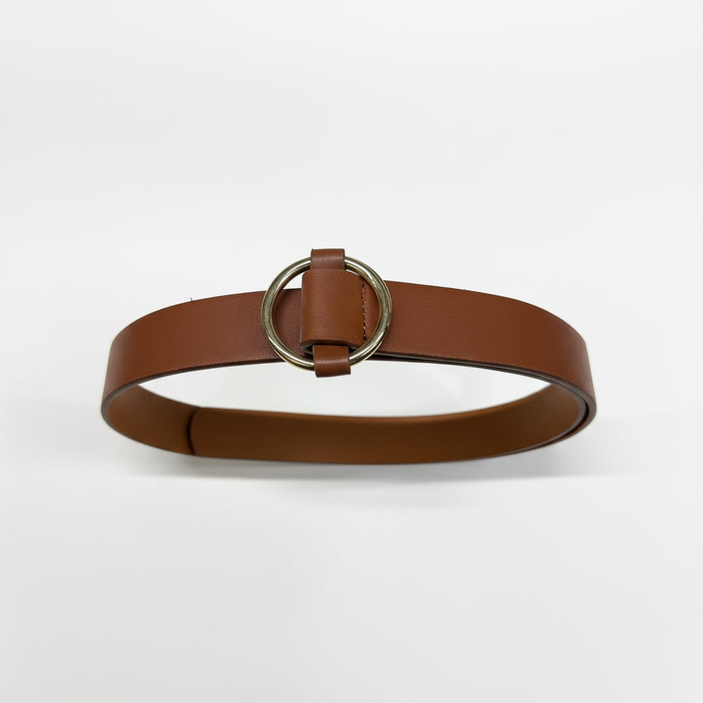 Brown leather belt with a gold ring buckle on a white background