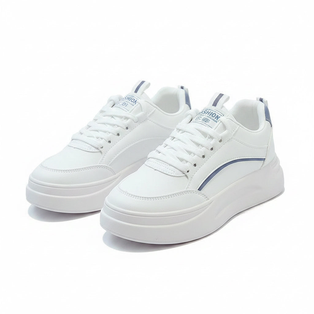White sneakers with blue accents on a gray surface