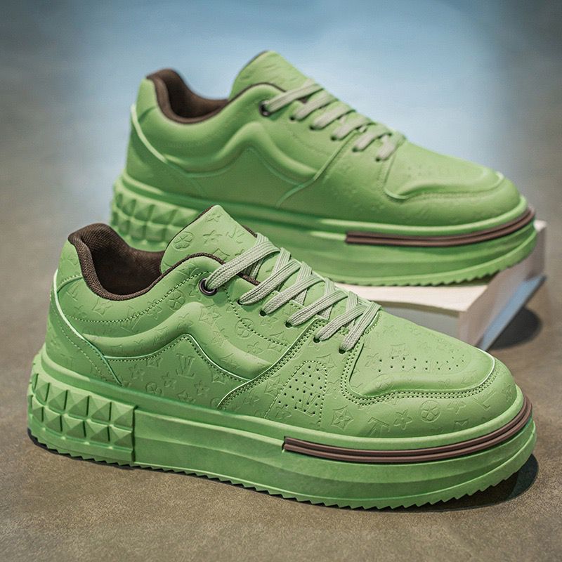 Green sneakers with brown accents on a gradient background
