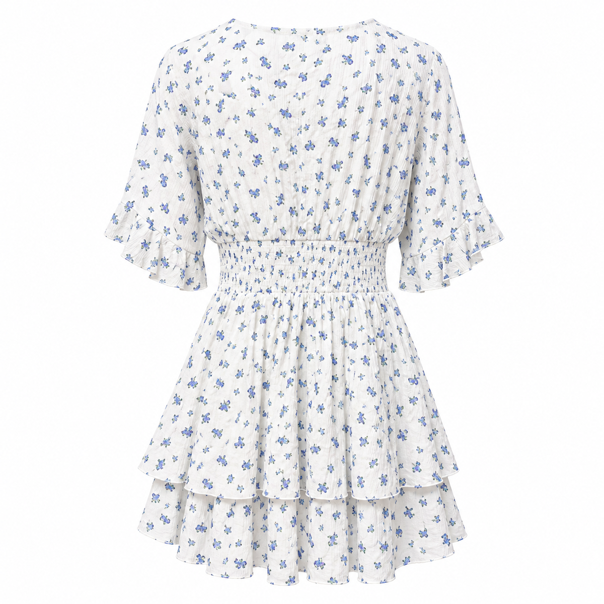 Back view of AMISU white and blue floral mini dress showing the smocked waist, short ruffle sleeves and tiered skirt.