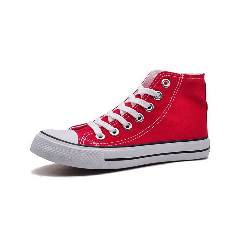 Red high-top sneaker with white laces on a white background