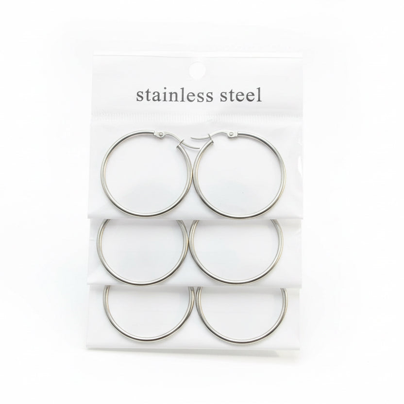 Set of stainless steel hoop earrings on a white background with 'stainless steel' text.