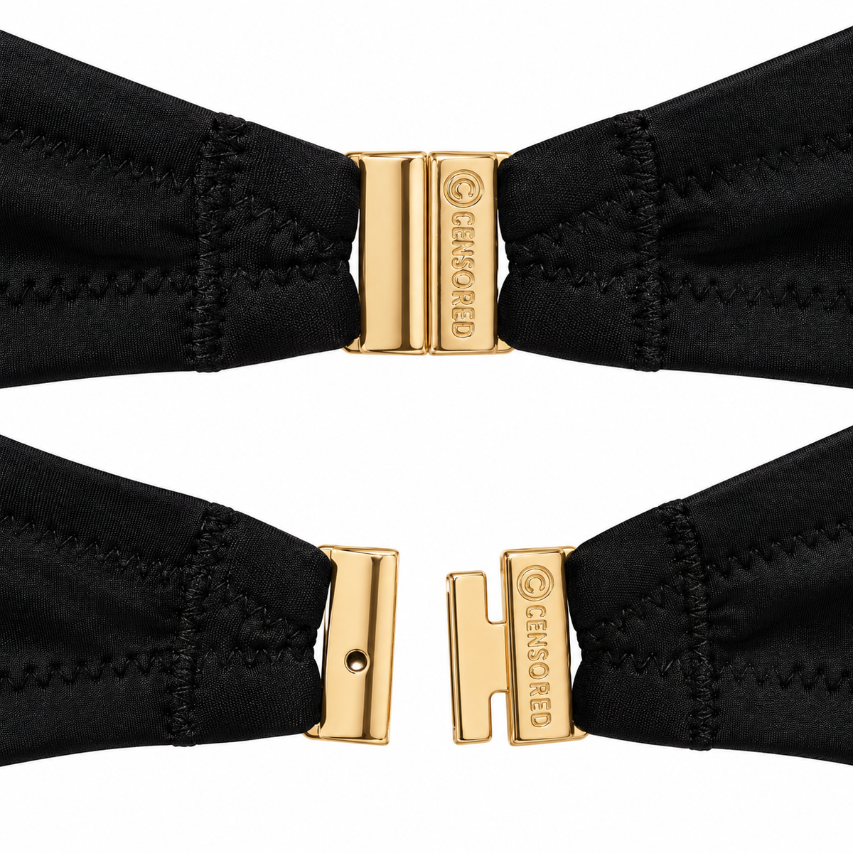 Close-up of black bikini top with gathered cups and decorative gold-tone rings