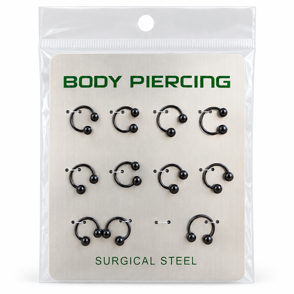Black horseshoe piercing rings displayed on surgical steel body piercing packaging
