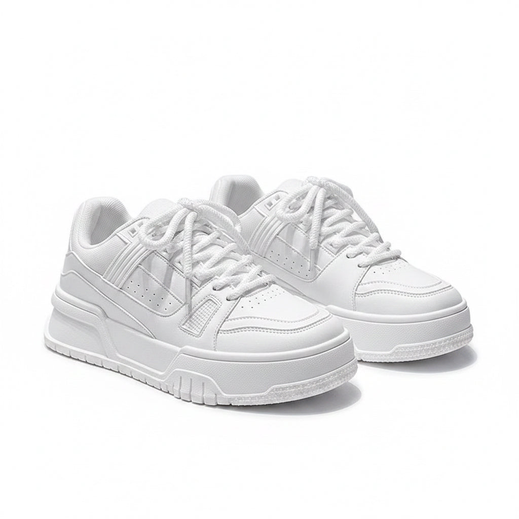 White sneakers on a concrete surface with a yellow caution tape in the background