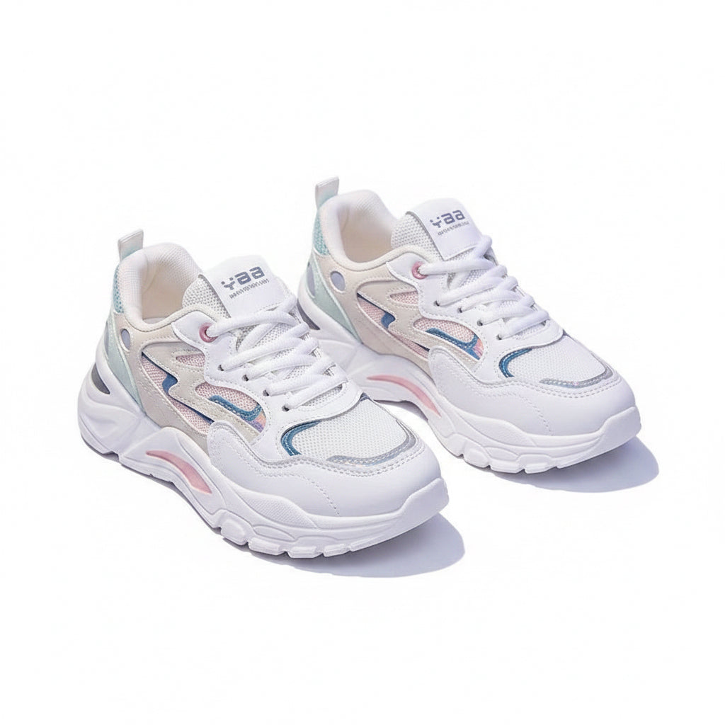 White sneakers with colorful accents on a dark surface