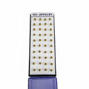 Set of gold jewelry components on a display card with '925 Jewelry' label.