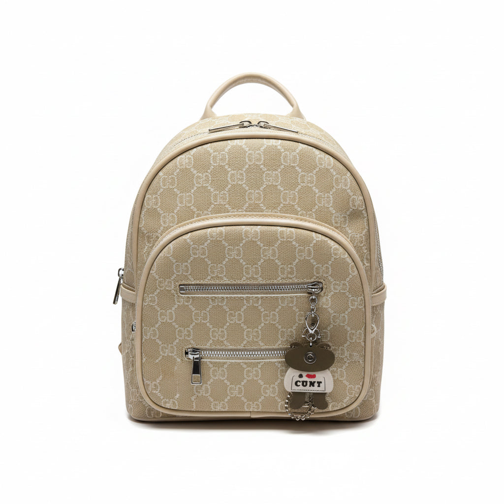 Beige handbag with brand logo on a white surface, with a shopping cart in the background.