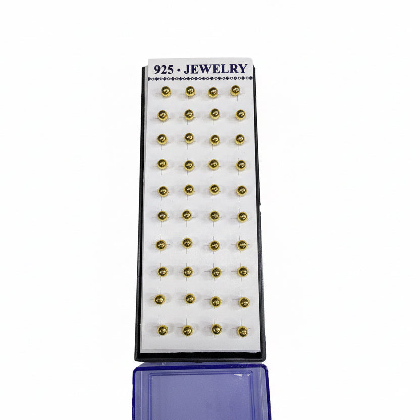 Set of gold jewelry components on a display card with '925 Jewelry' label.