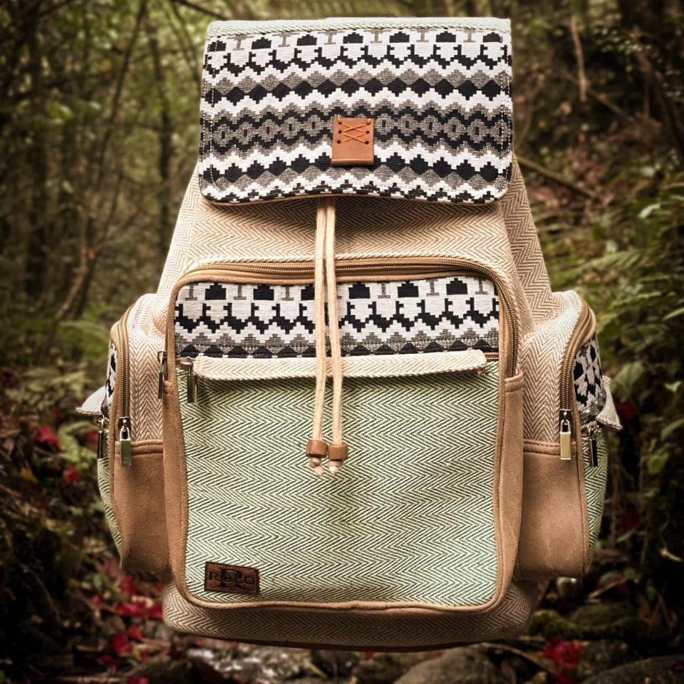 Backpack with patterned top section in a forest setting