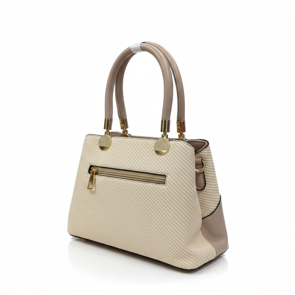 Beige handbag with textured pattern on a white background