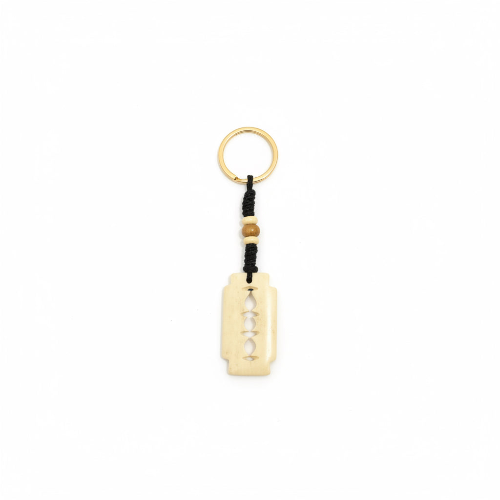 Unique Hand-Carved Bone Keychain | Blade Design Travel Keepsake