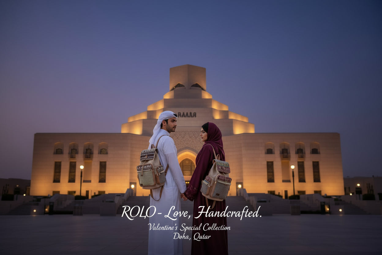 Couple holding hands in front of a building with 'ROLO' backpacks.