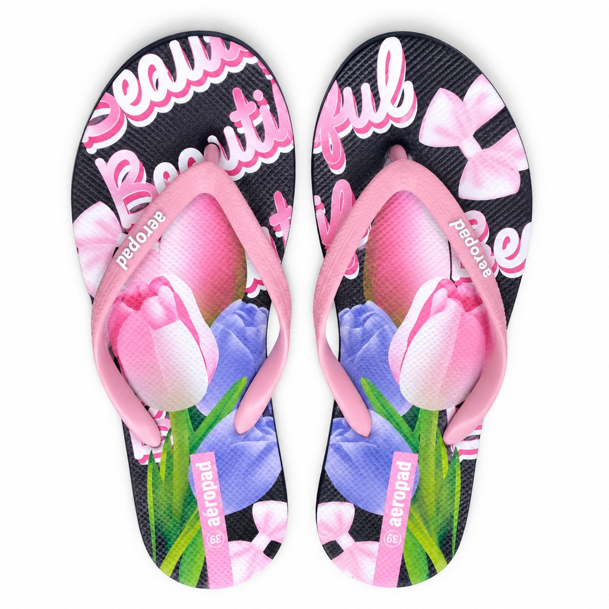 Aeropad women's floral graphic flip flops with black footbed and light pink straps, size 36