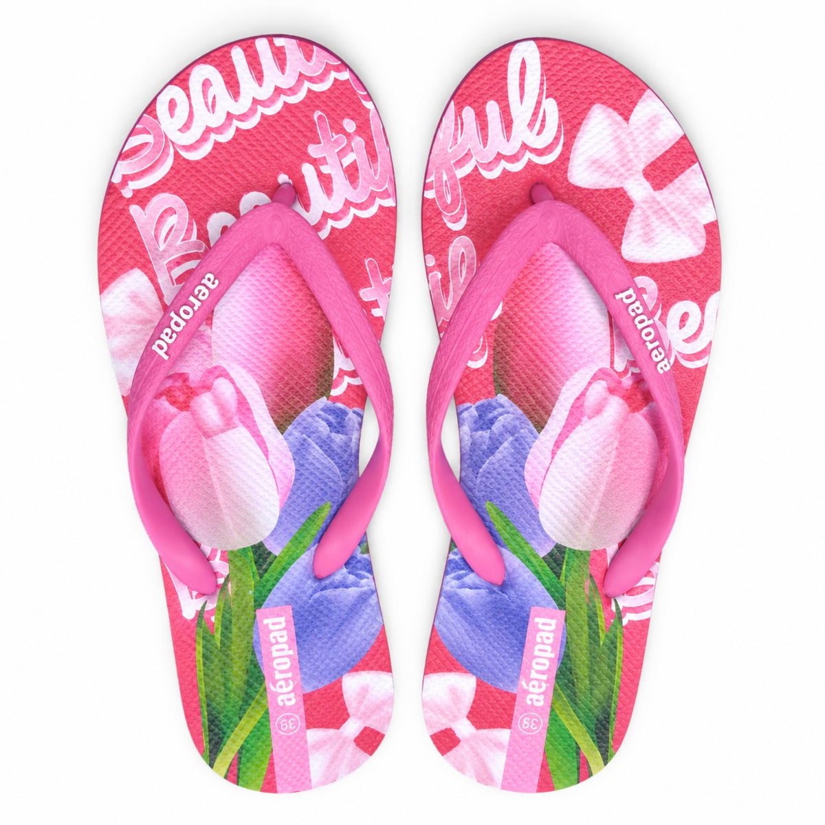 Aeropad women's floral graphic flip flops in pink with multicolor print, size 36