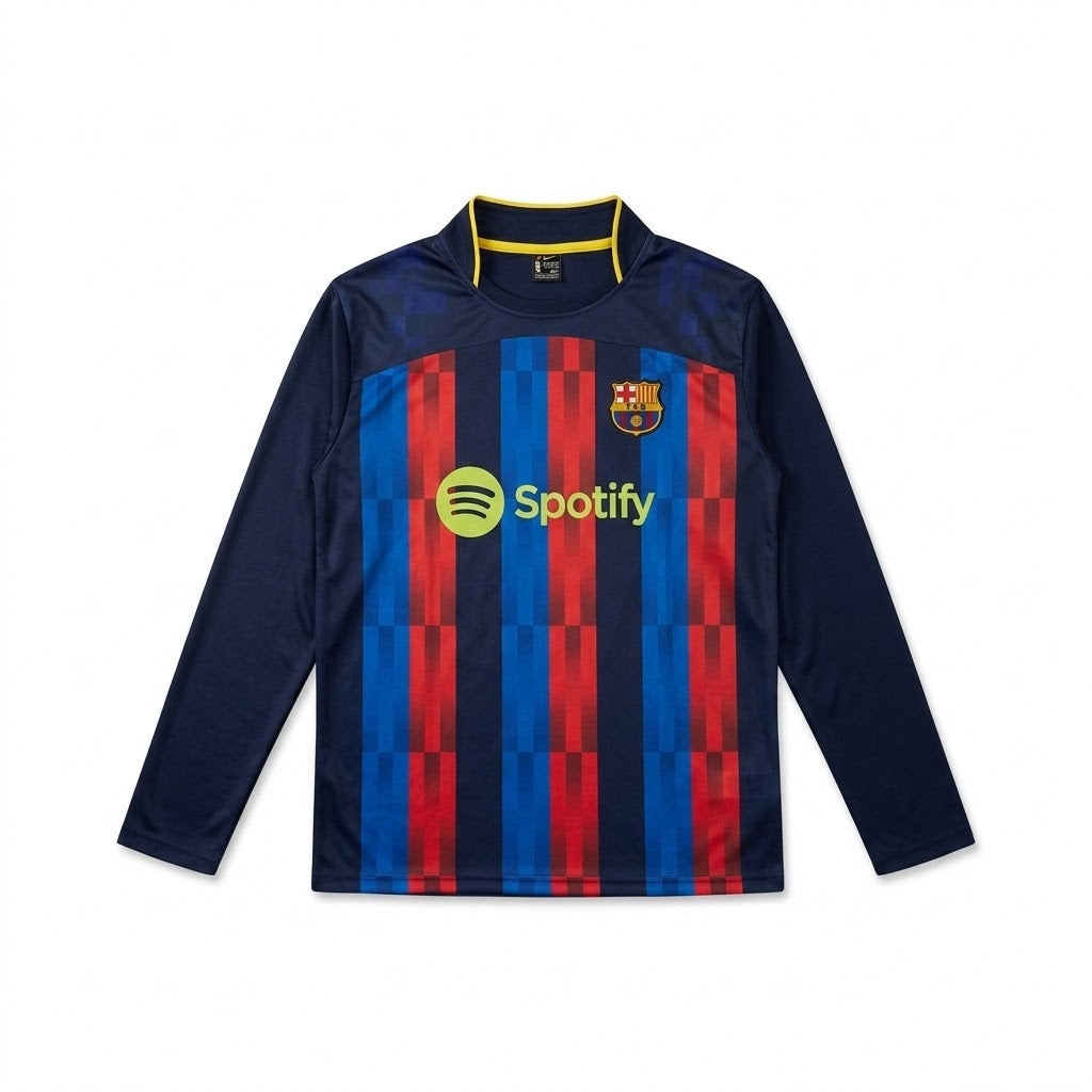 A long-sleeve athletic jersey with a mock neck, featuring vertical navy, red, and blue stripes on the front, with a Spotify logo and FC Barcelona crest.