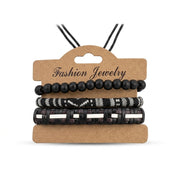 Black multi-strand woven leather and bead bracelet set on display card