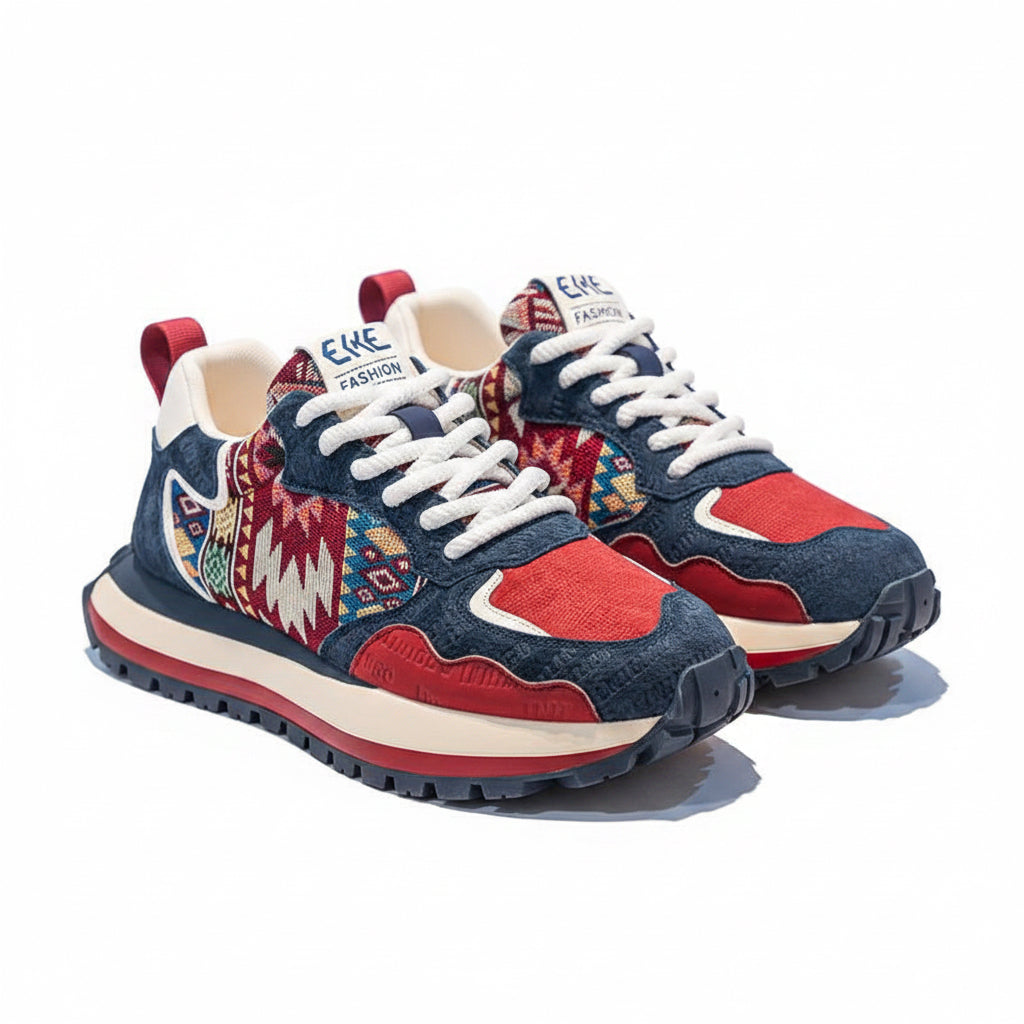 A pair of ELKE FASHION men's sneakers featuring a bold red, navy blue, and white color scheme with geometric ethnic patterns on the side panels and a thick white and red chunky sole.