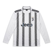 A white long-sleeve Juventus soccer jersey with black vertical stripes, featuring the black and white Juventus club crest on the chest, the black Jeep sponsor logo, and black shoulder stripes.