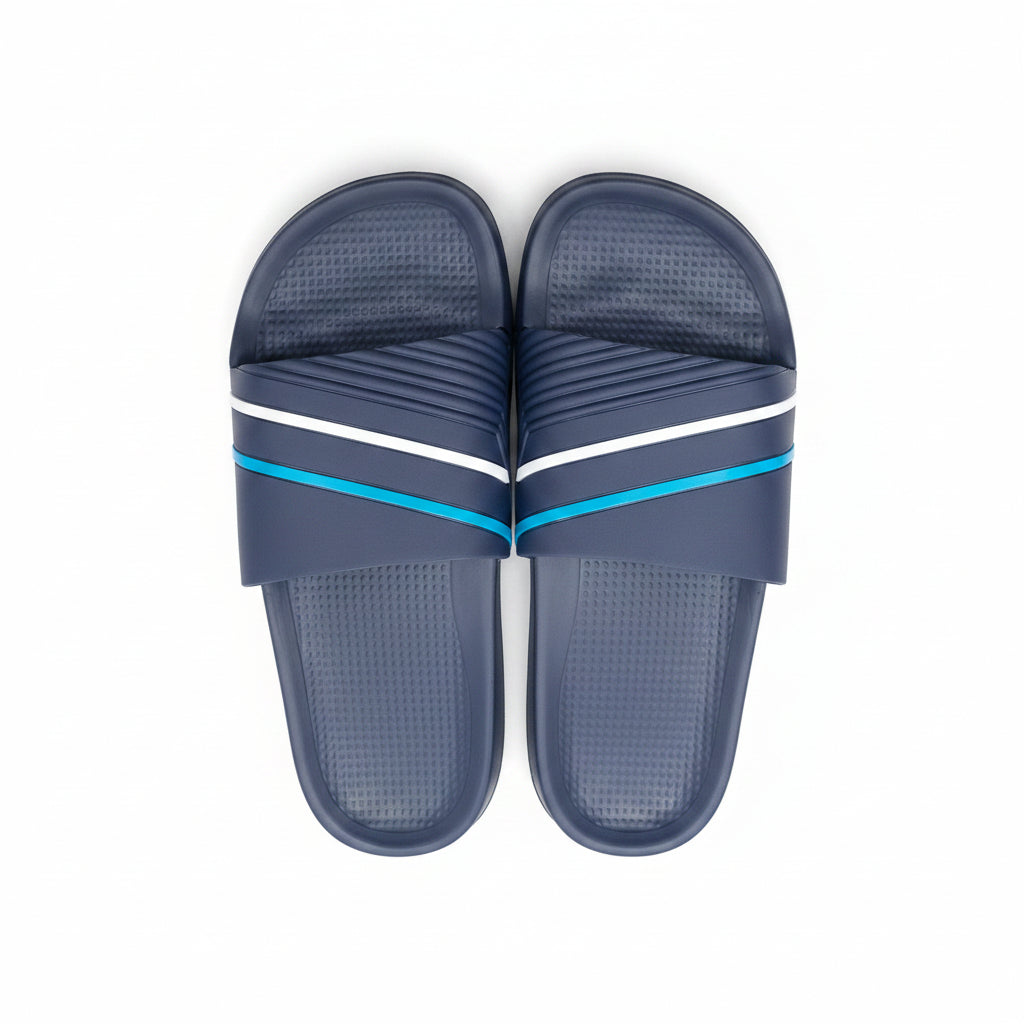 Top view of a pair of men's navy blue slide sandals featuring cyan and white stripe accents on the upper strap.