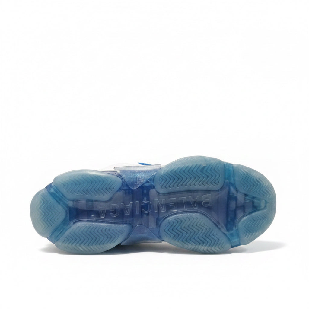 Chunky platform sneakers for men in white and blue sole view showing durable patterned grip
