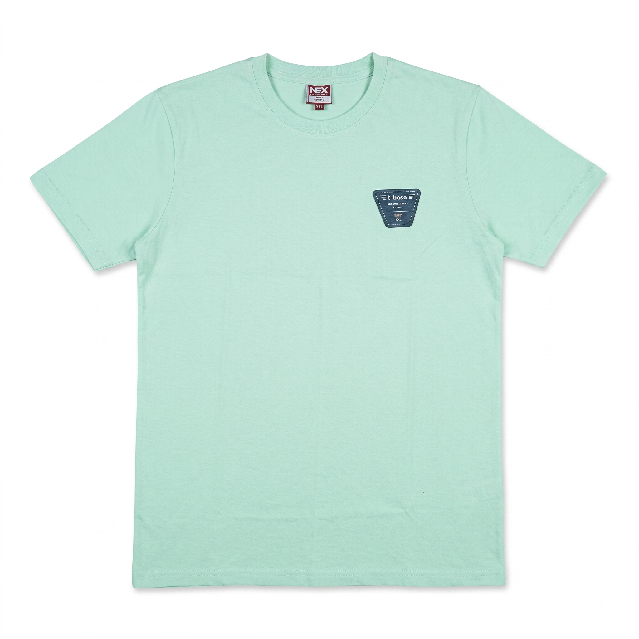 A mint green crewneck t-shirt with a small dark blue-green shield-shaped patch on the left chest containing the text 'John Deere'. The shirt is laid flat against a clean white background.