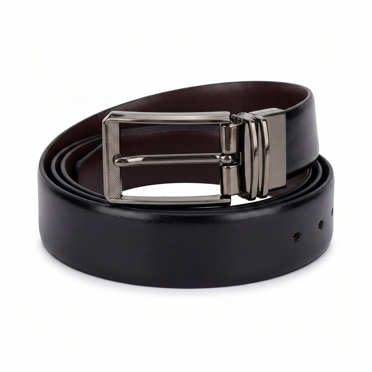 Men's reversible black and brown leather belt with gunmetal pin buckle rolled on a white background