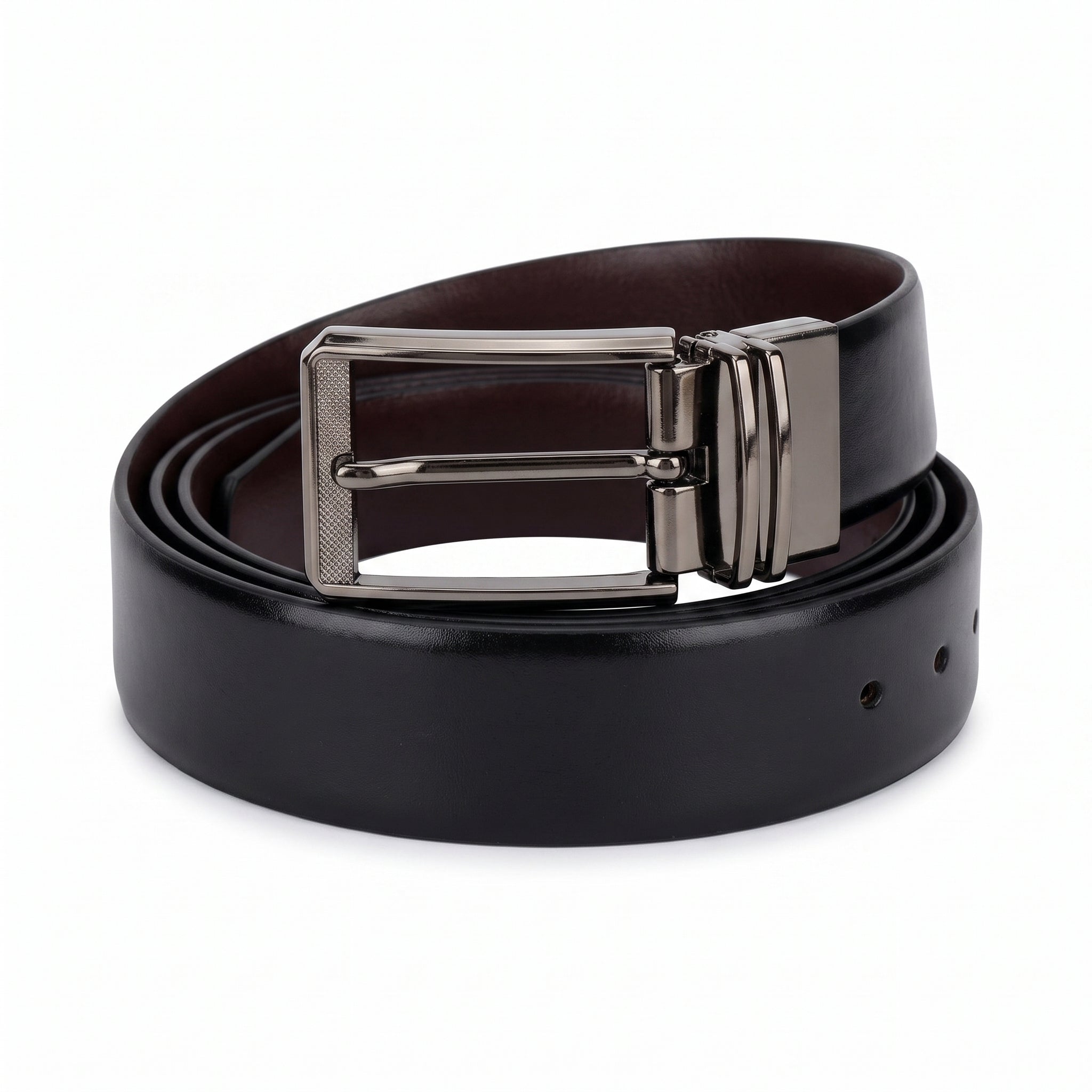 Men's reversible black and brown leather belt with gunmetal pin buckle rolled on a white background