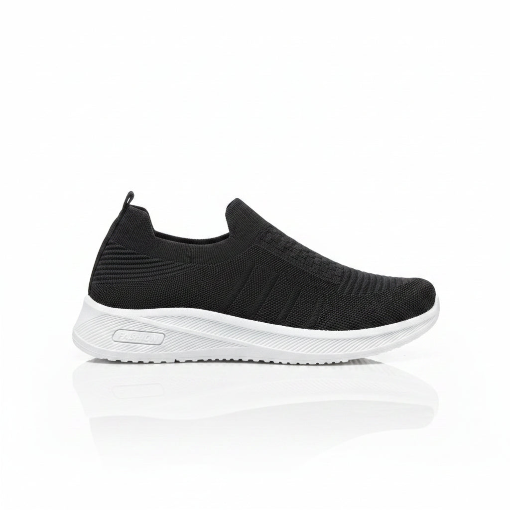 Mens black slip on walking shoes with breathable knit upper and white cushioned sole