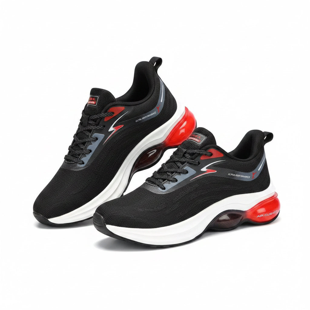 Black running shoes with red and grey accents featuring a breathable mesh upper and a thick white air-cushioned sole.