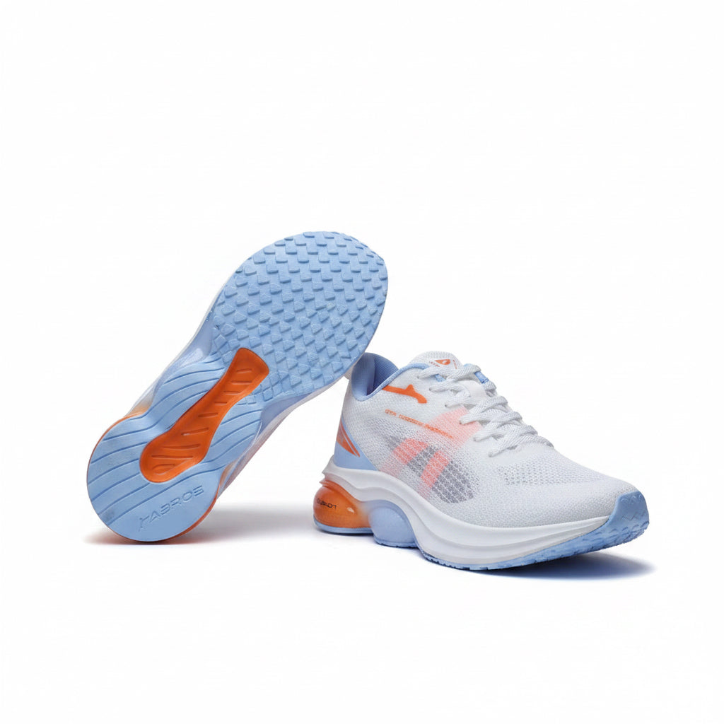 White running shoes with vibrant orange and light blue accents featuring a textured mesh upper and a thick air-cushioned sole.