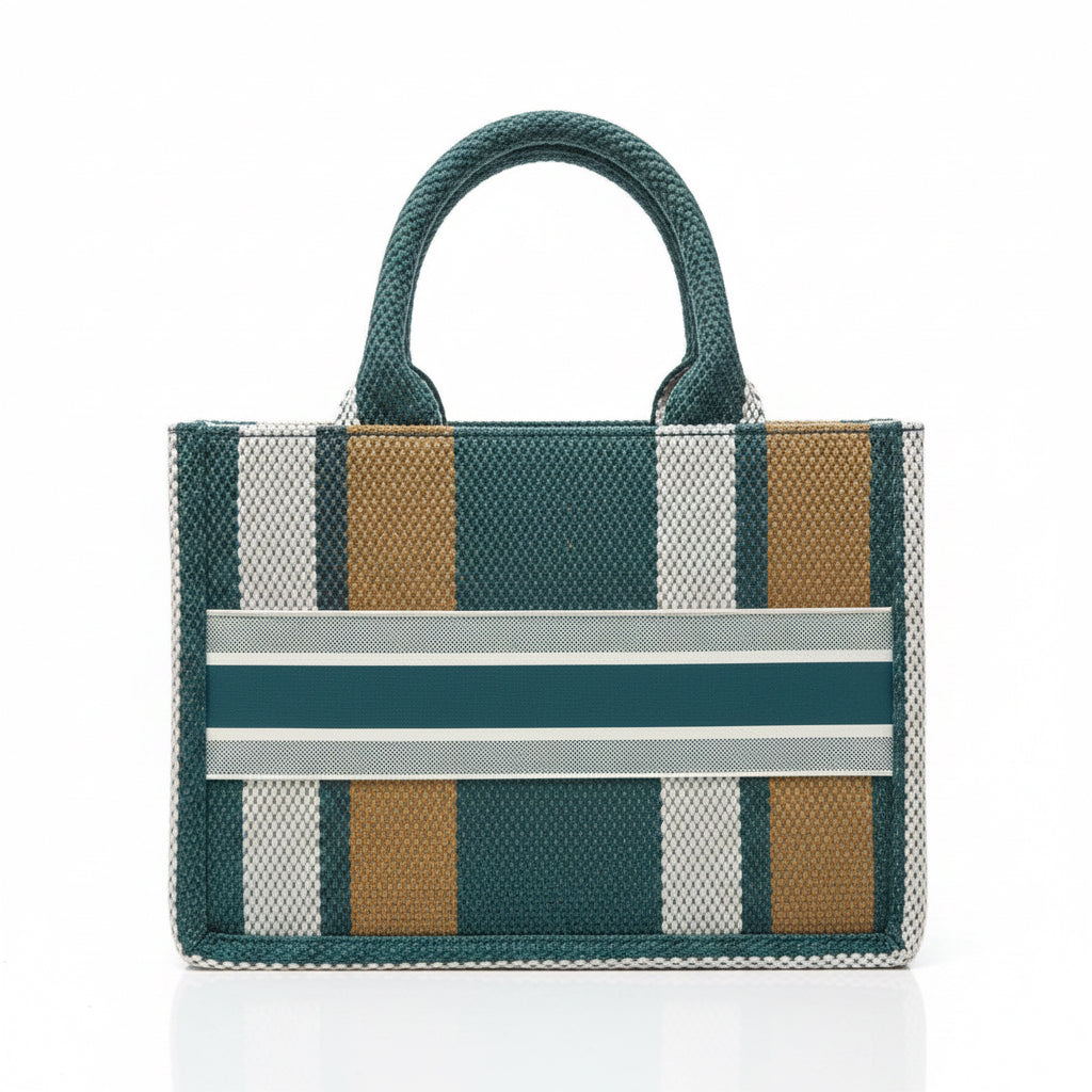 Striped tote bag green color in a store setting