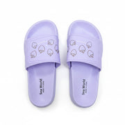 Pair of lavender purple slides featuring a cute strawberry pattern on the strap.